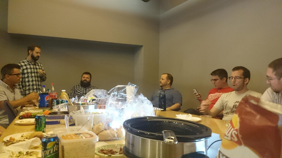 image of NEWMEDIA employees enjoying bbq potluck